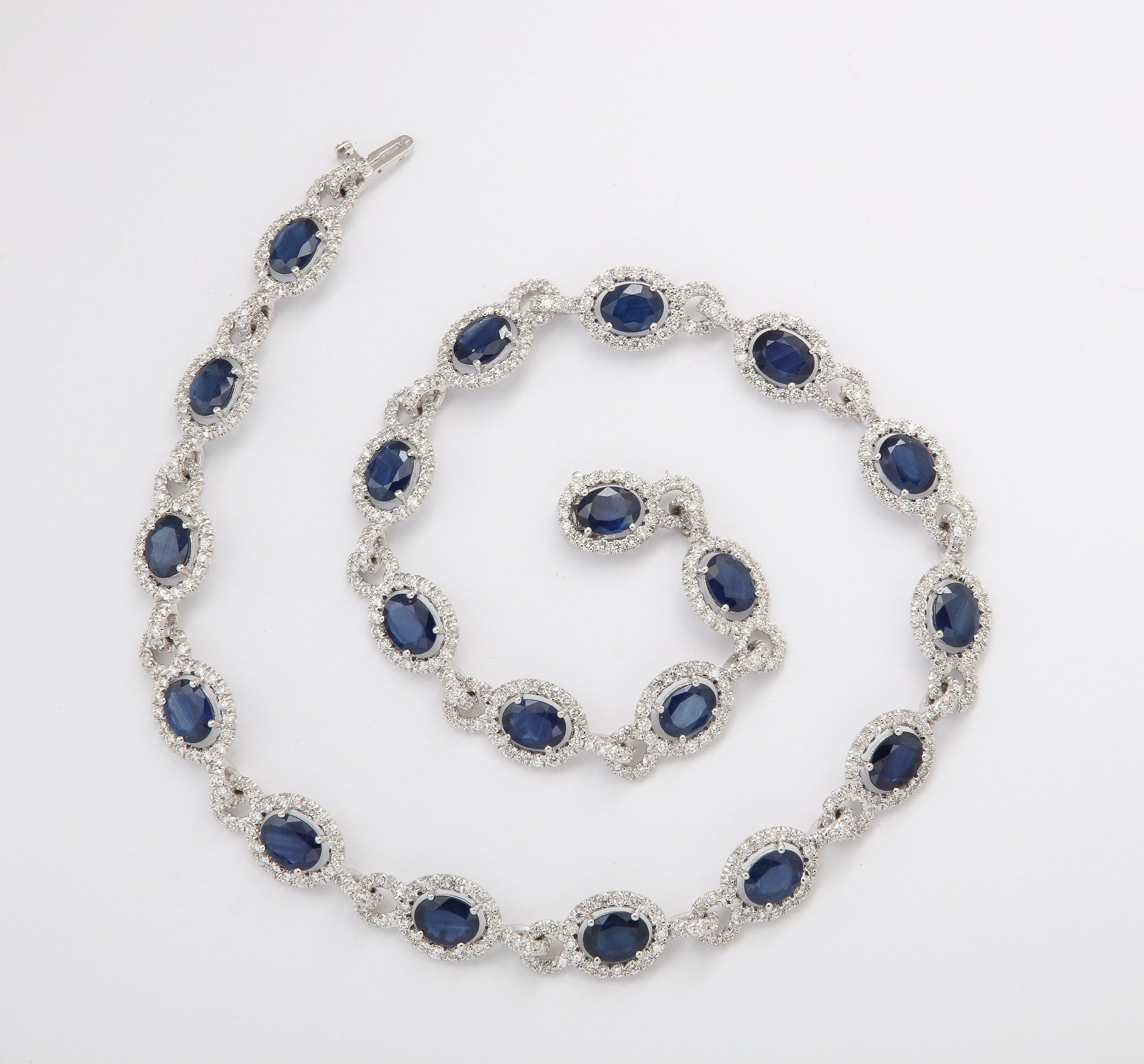 https://a.1stdibscdn.com/sapphire-and-diamond-necklace-for-sale-picture-7/j_415/j_203672721694713990331/6R1A8759_master.jpg