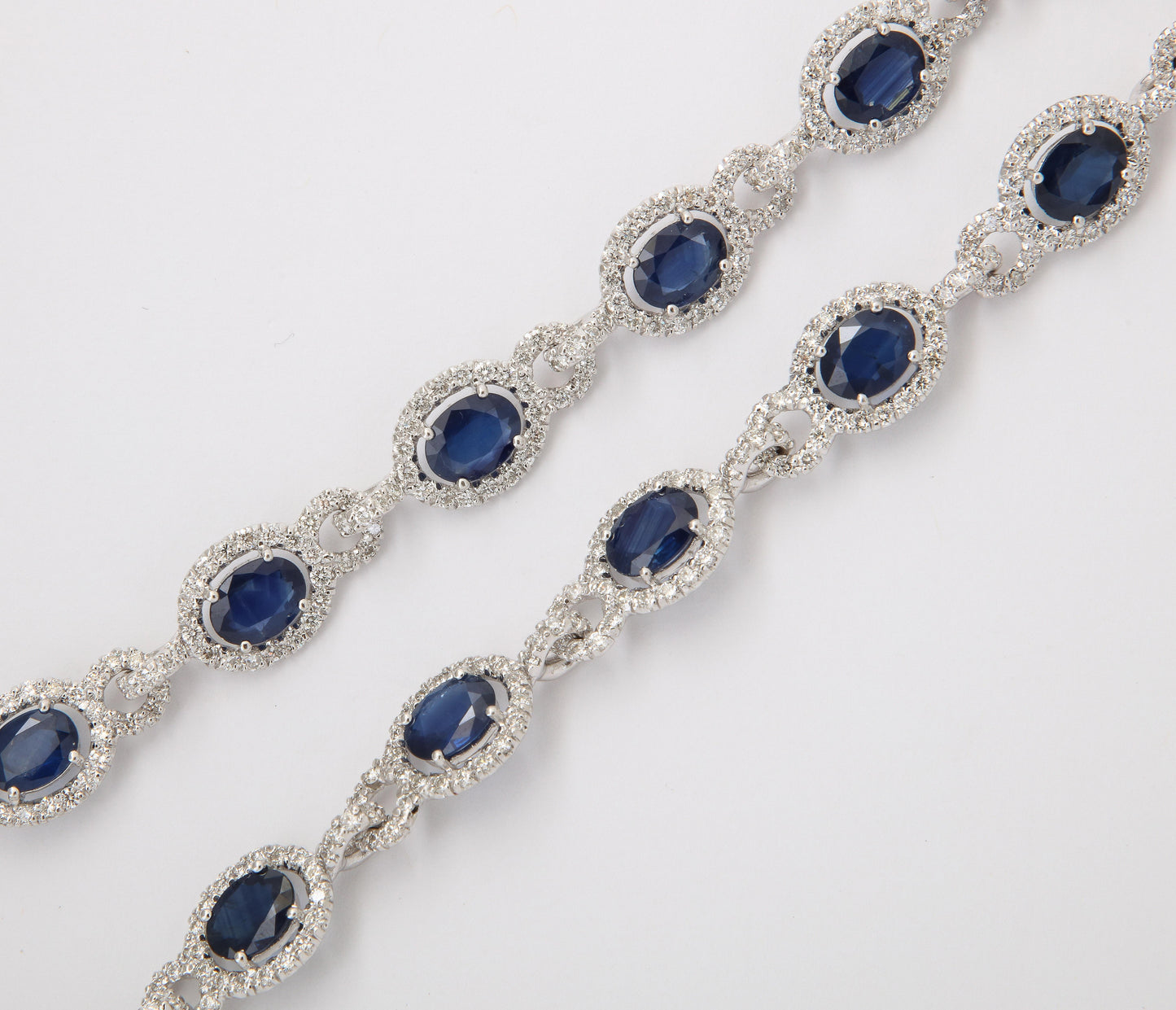 https://a.1stdibscdn.com/sapphire-and-diamond-necklace-for-sale-picture-8/j_415/j_203672721694713994308/6R1A8760_master.jpg