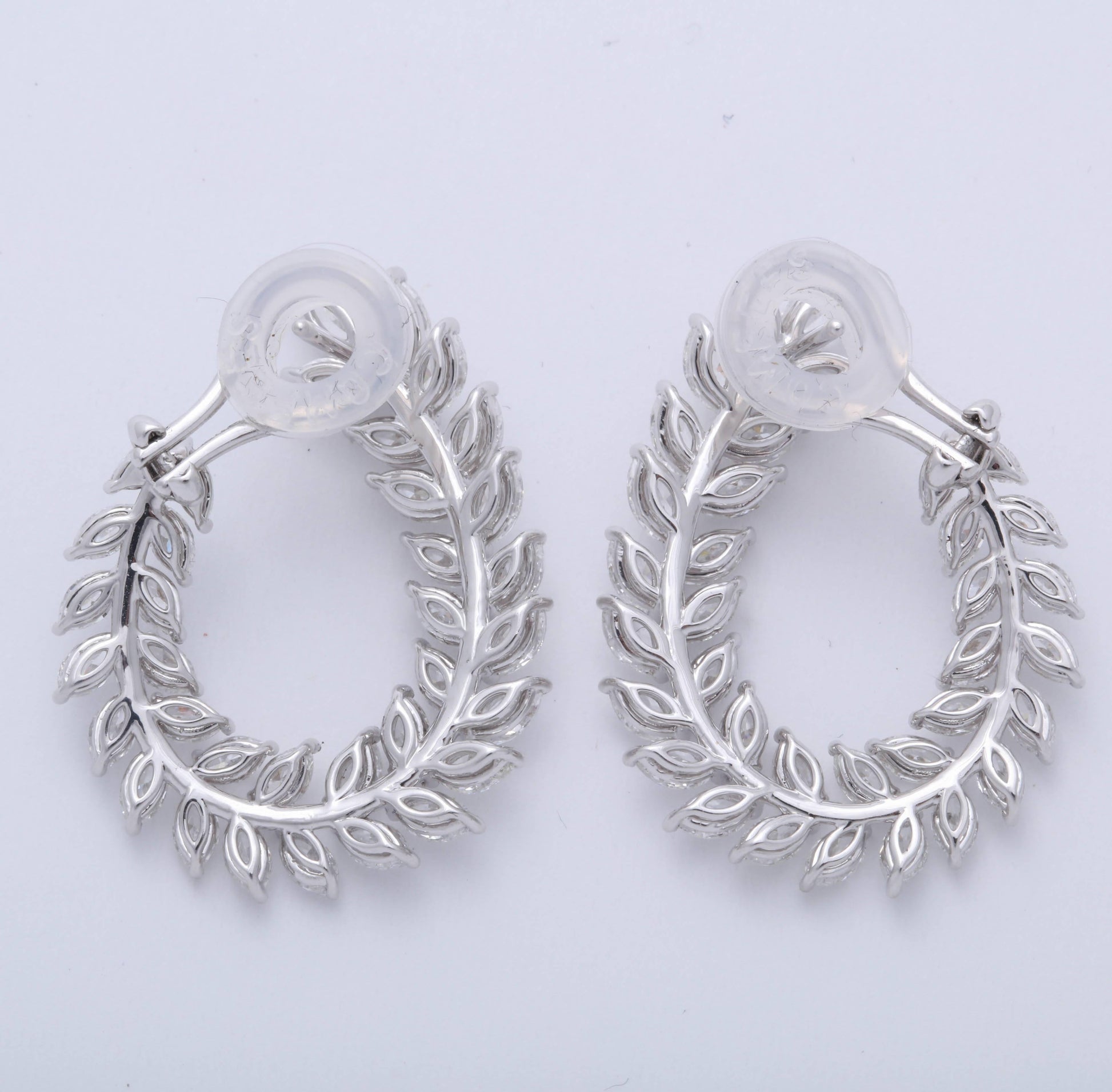 https://a.1stdibscdn.com/marquise-diamond-swirl-earring-for-sale-picture-6/0/j_45216831530288148724/6R1A9123_master.jpg