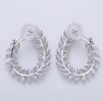 https://a.1stdibscdn.com/marquise-diamond-swirl-earring-for-sale-picture-6/0/j_45216831530288148724/6R1A9123_master.jpg