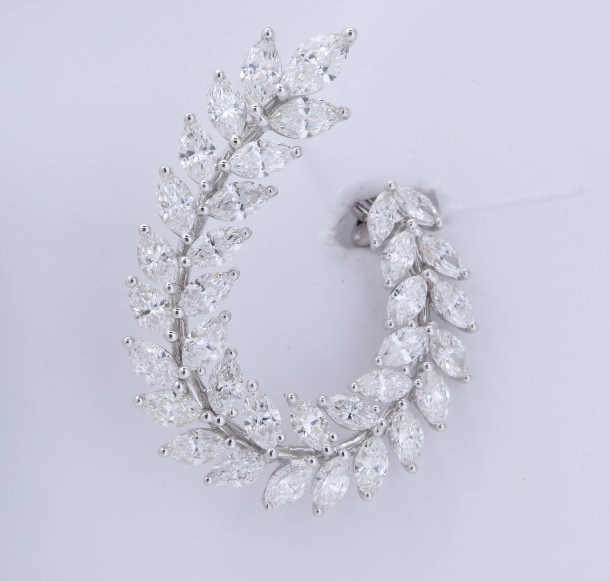 https://a.1stdibscdn.com/marquise-diamond-swirl-earring-for-sale-picture-7/0/j_45216831530288150550/6R1A9128_master.jpg