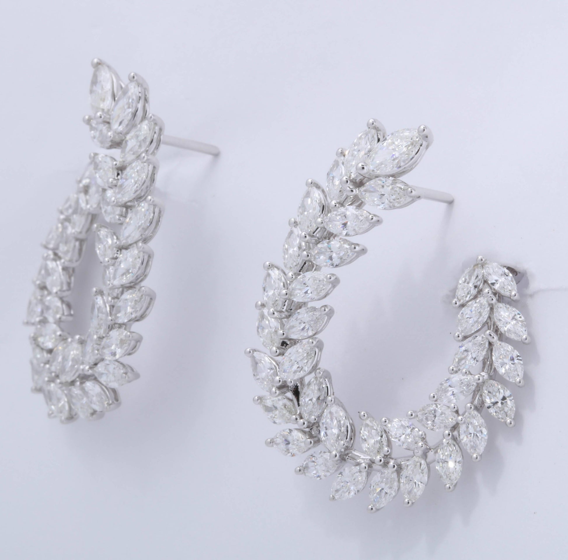 https://a.1stdibscdn.com/marquise-diamond-swirl-earring-for-sale-picture-8/0/j_45216831530288151893/6R1A9129_master.jpg