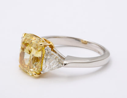 https://a.1stdibscdn.com/gia-certified-4-carat-fancy-intense-yellow-diamond-ring-for-sale-picture-3/j_415/1598973560110/6R1A9299_master.jpg