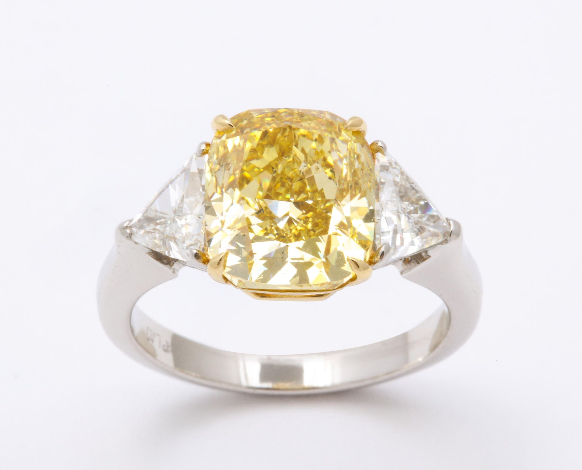 https://a.1stdibscdn.com/gia-certified-4-carat-fancy-intense-yellow-diamond-ring-for-sale-picture-5/j_415/1598973568687/6R1A9303_master.jpg