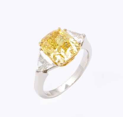 https://a.1stdibscdn.com/gia-certified-4-carat-fancy-intense-yellow-diamond-ring-for-sale-picture-7/j_415/1598973571162/6R1A9305_master.jpg
