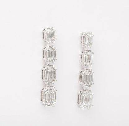 https://a.1stdibscdn.com/emerald-cut-illusion-diamond-dangle-drop-earrings-for-sale-picture-6/j_415/j_164838221658497396828/6R1A9427_master.jpg?width=768
