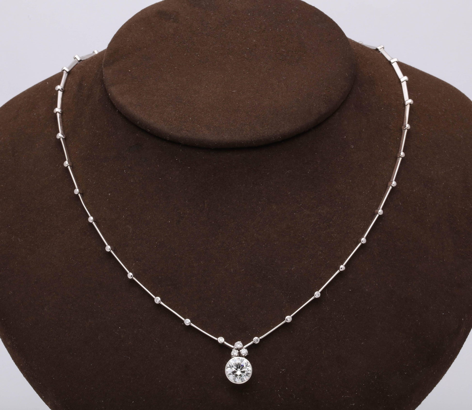 https://a.1stdibscdn.com/round-diamond-solitaire-necklace-gia-certified-for-sale-picture-2/0/j_42665831525894118261/6R1A9445_master.jpg