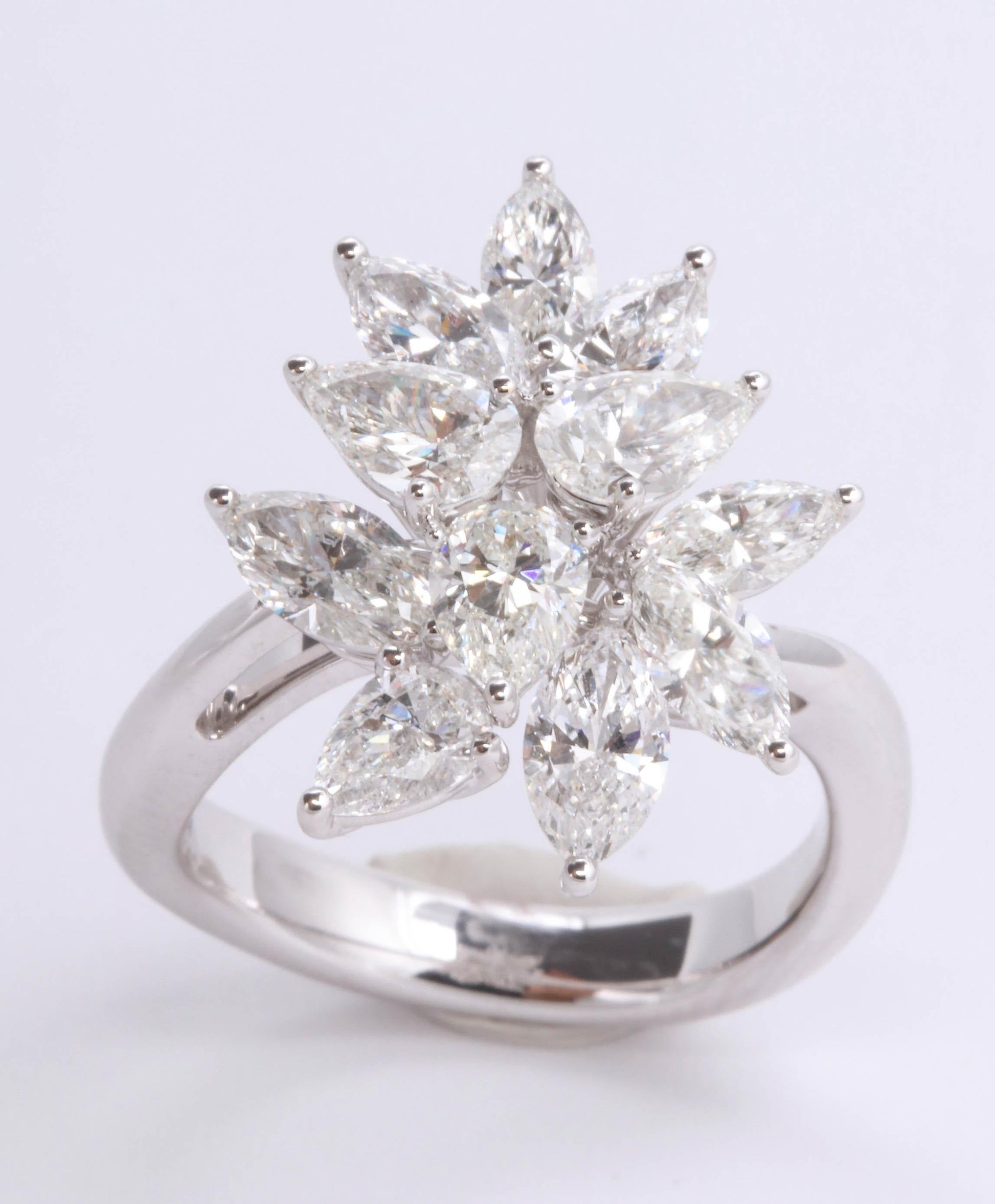 https://a.1stdibscdn.com/diamond-cluster-ring-for-sale-picture-2/0/j_50847211539355655660/6R1A9582_master.jpg