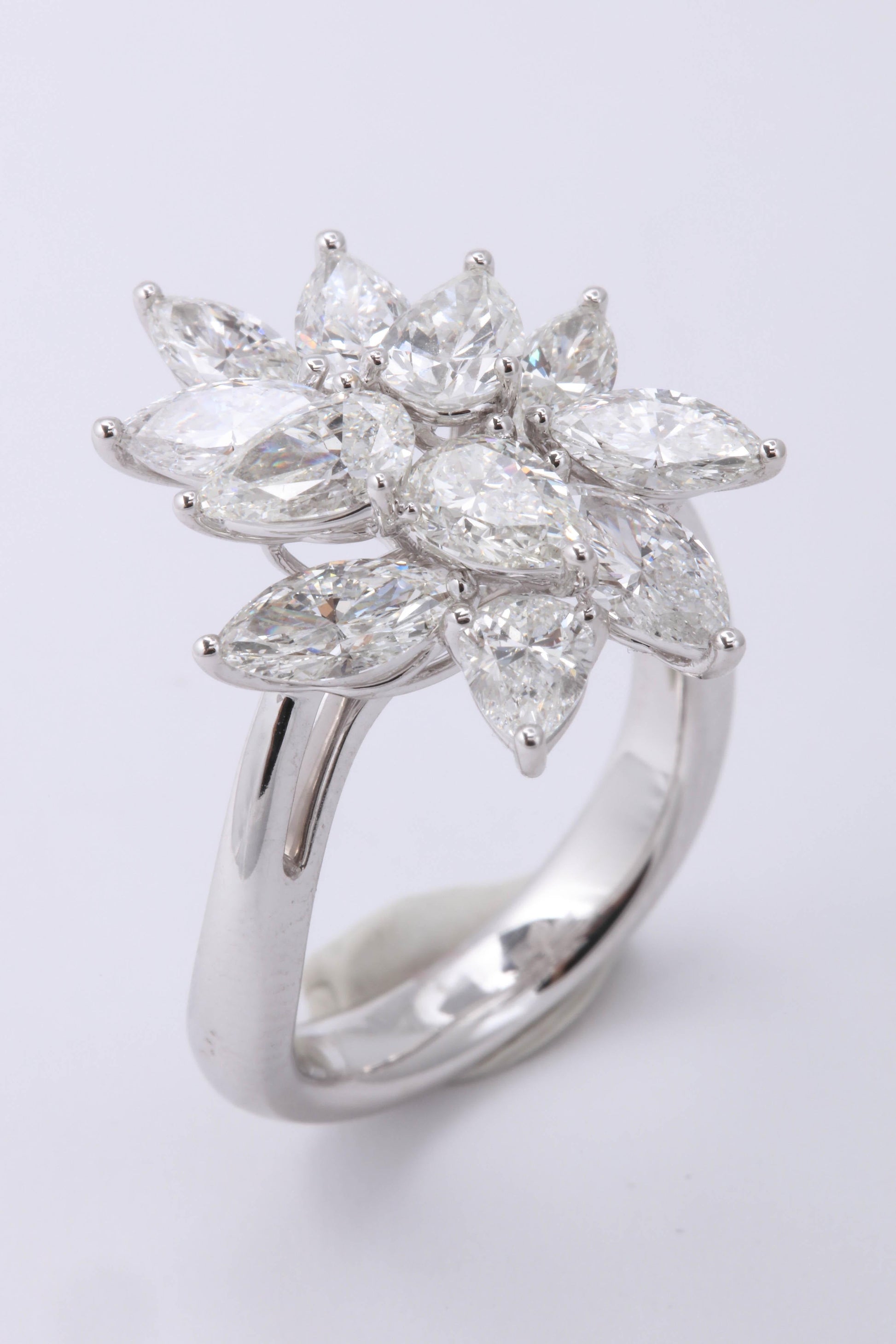 https://a.1stdibscdn.com/diamond-cluster-ring-for-sale-picture-8/0/j_50847211539355656349/6R1A9590_master.jpg