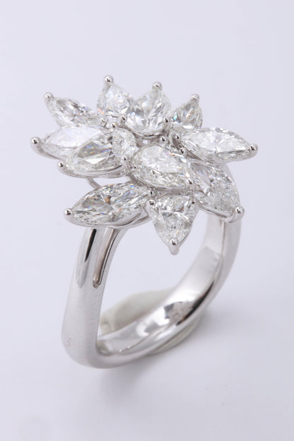 https://a.1stdibscdn.com/diamond-cluster-ring-for-sale-picture-8/0/j_50847211539355656349/6R1A9590_master.jpg
