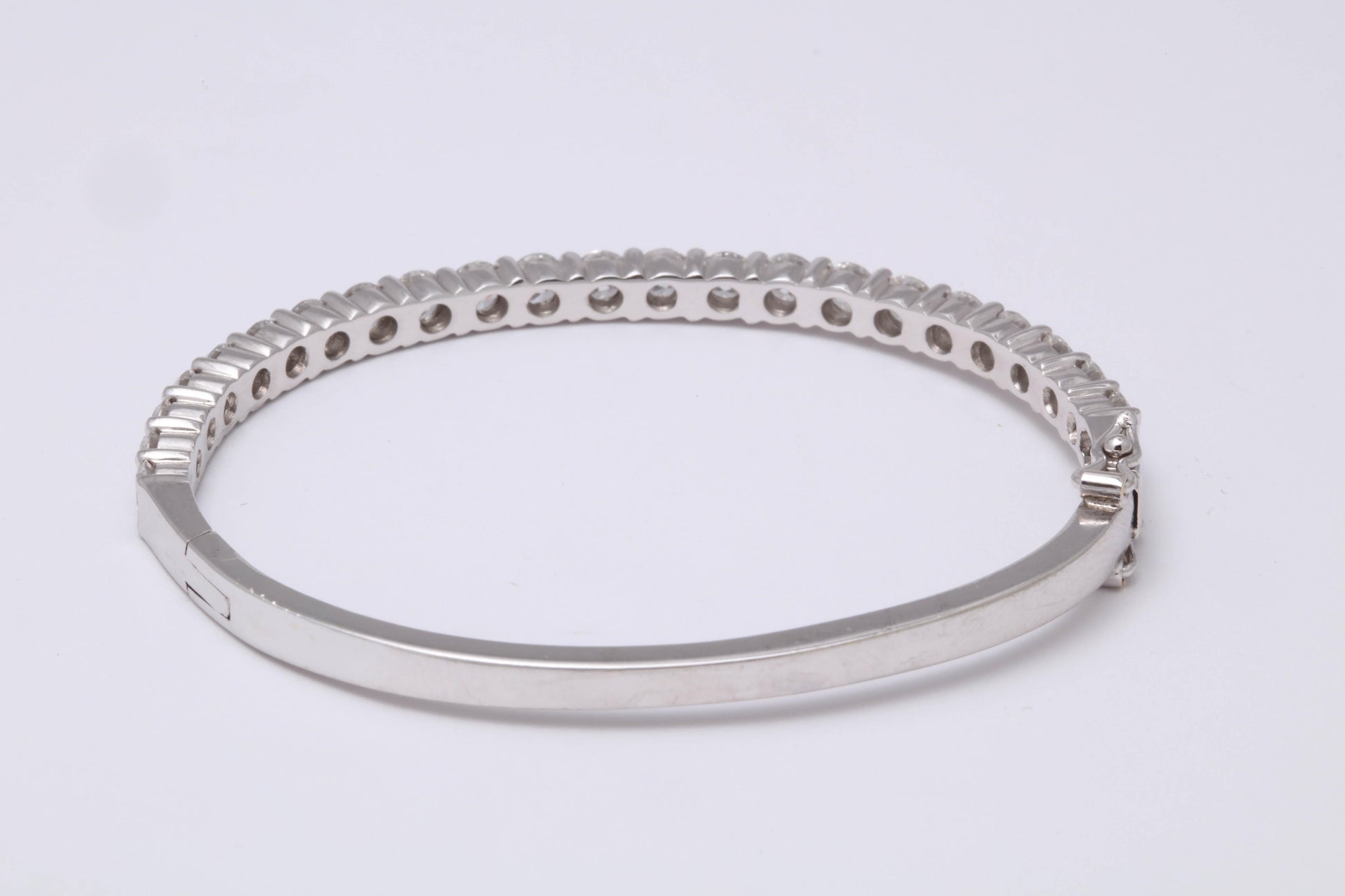 https://a.1stdibscdn.com/diamond-bangle-for-6-inch-wrist-for-sale-picture-5/0/j_50847111539355641823/6R1A9599_master.jpg