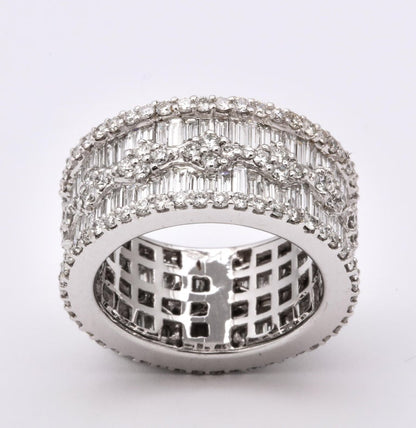 https://a.1stdibscdn.com/wide-baguette-and-round-diamond-band-for-sale-picture-4/j_415/1606754927586/6R1A9891_master.jpg?width=768