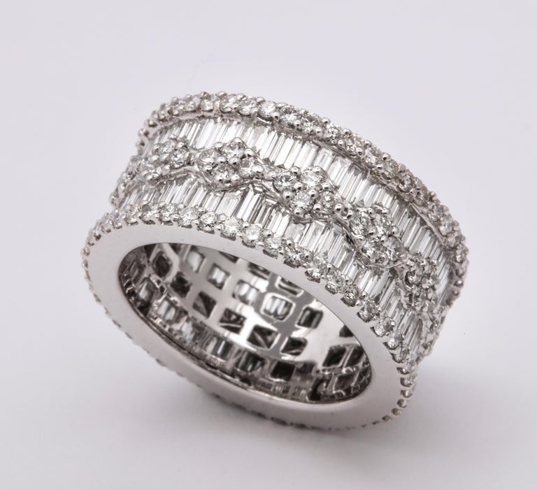 https://a.1stdibscdn.com/wide-baguette-and-round-diamond-band-for-sale-picture-5/j_415/1606754932607/6R1A9892_master.jpg?width=768