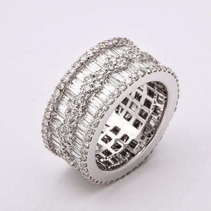 https://a.1stdibscdn.com/wide-baguette-and-round-diamond-band-for-sale-picture-6/j_415/1606754935736/6R1A9893_master.jpg?width=768