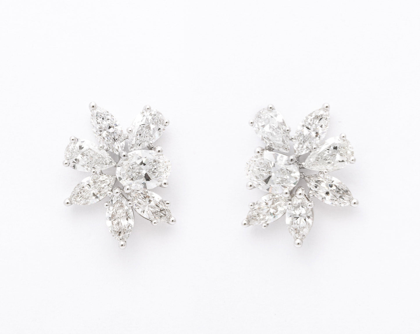 https://a.1stdibscdn.com/diamond-cluster-earrings-for-sale-picture-4/j_415/j_141445021639062293249/6R1A9894_master.jpg
