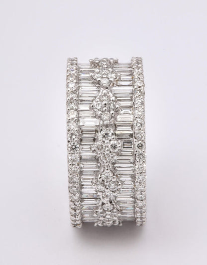 https://a.1stdibscdn.com/wide-baguette-and-round-diamond-band-for-sale-picture-7/j_415/1606754939280/6R1A9894_master.jpg?width=768