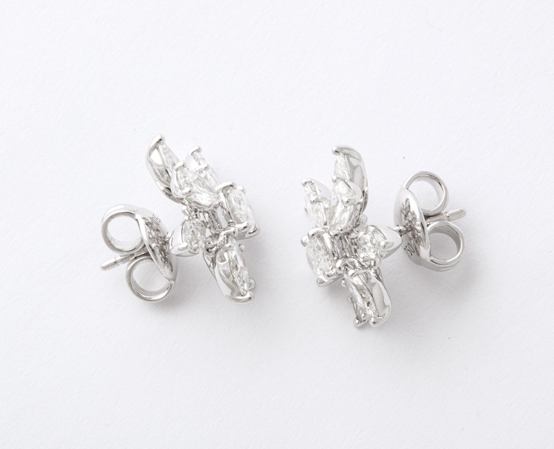 https://a.1stdibscdn.com/diamond-cluster-earrings-for-sale-picture-8/j_415/j_141445021639062296514/6R1A9903_master.jpg