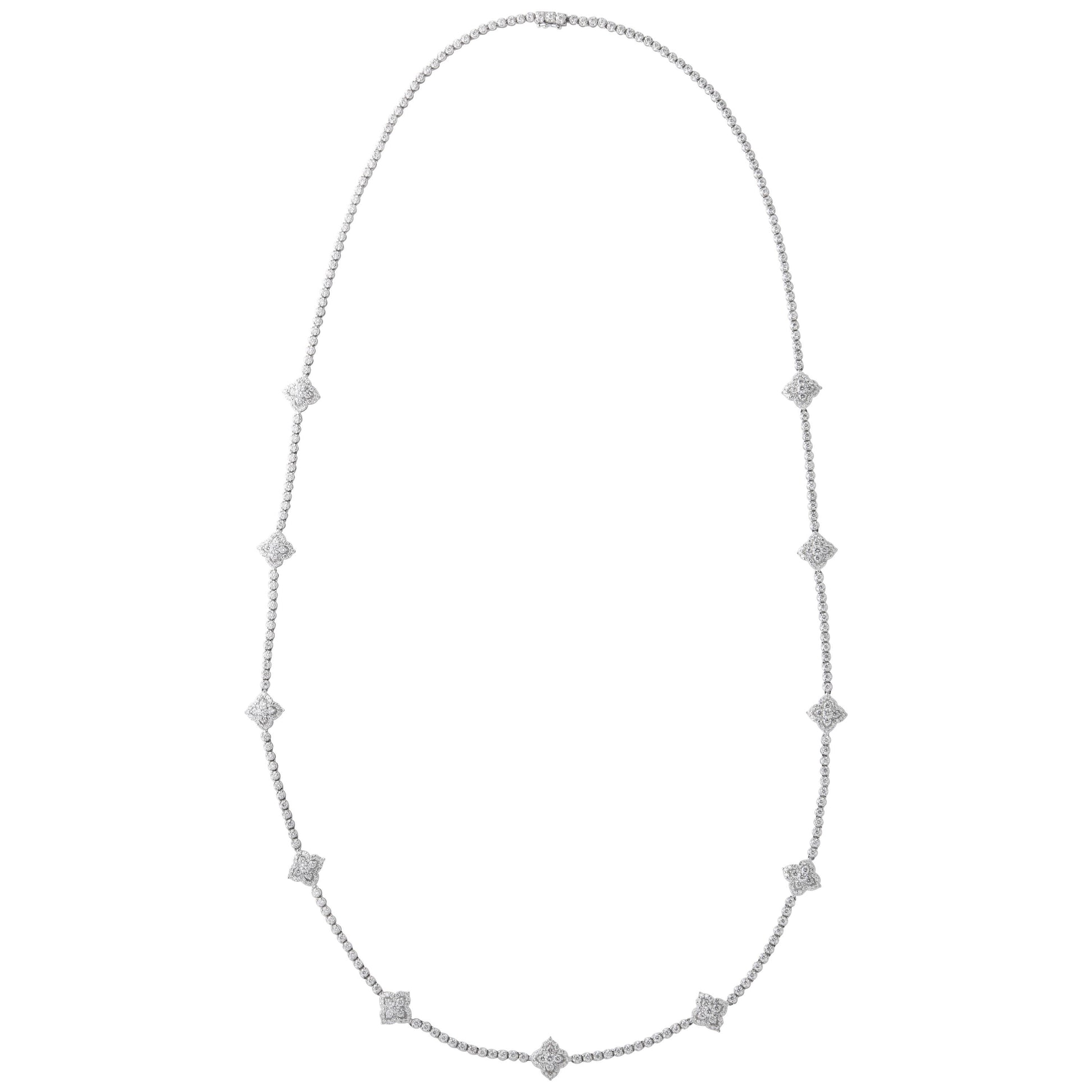 https://a.1stdibscdn.com/long-diamond-tennis-necklace-with-diamond-motifs-for-sale/1121189/j_72493121565360801420/7249312_master.jpg
