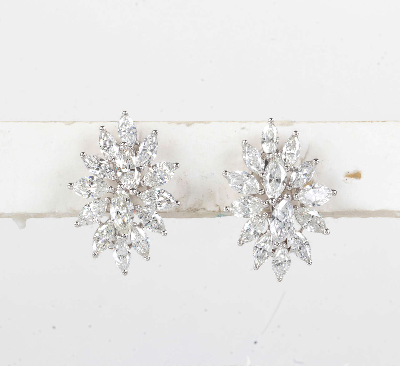 https://a.1stdibscdn.com/diamond-cluster-earrings-for-sale-picture-2/j_415/j_168437421661970101923/B.jpg