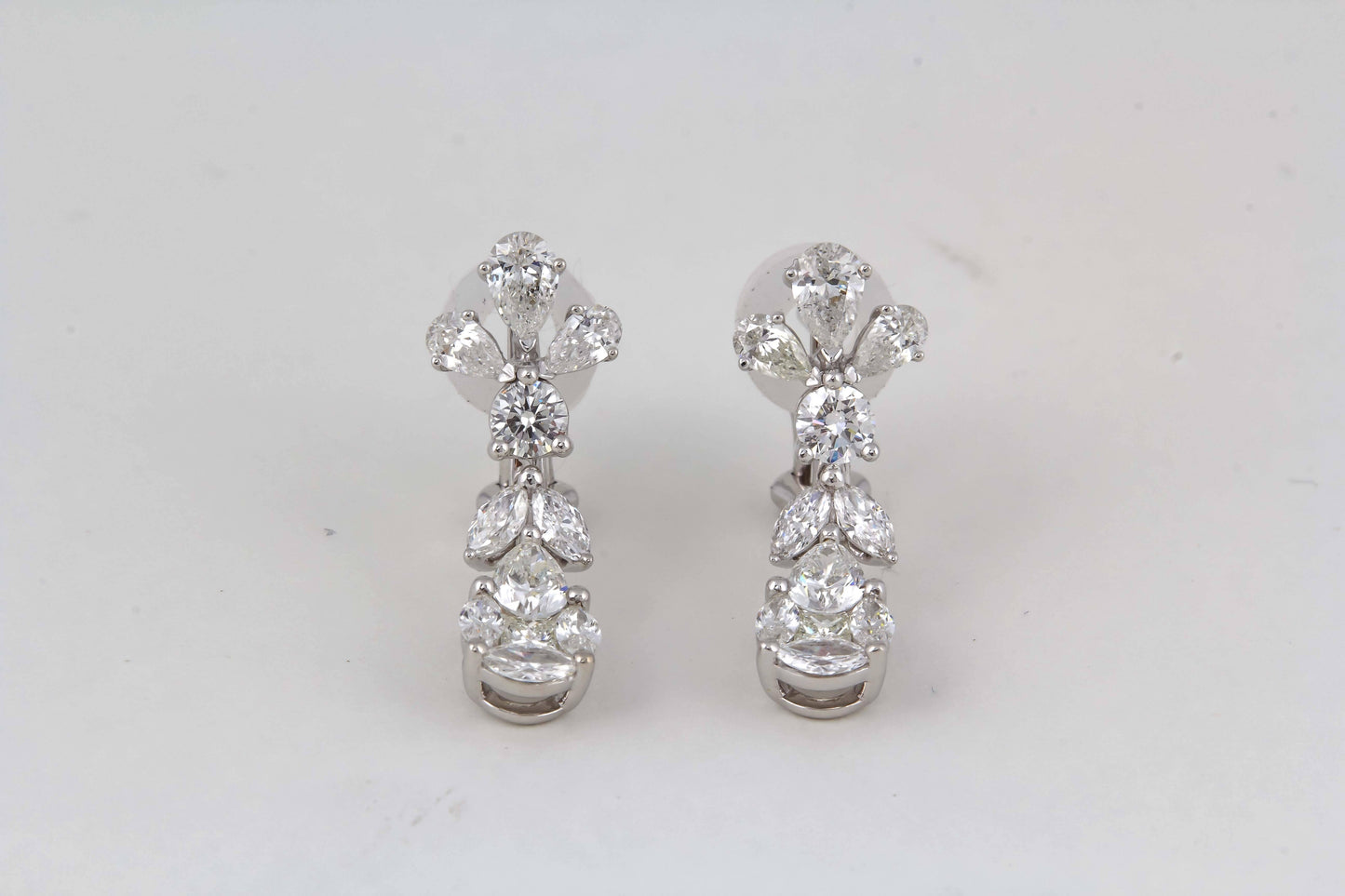 https://a.1stdibscdn.com/classic-diamond-drop-earrings-for-sale-picture-6/j_415/j_168438521661970465554/IMG_1790_master.jpg