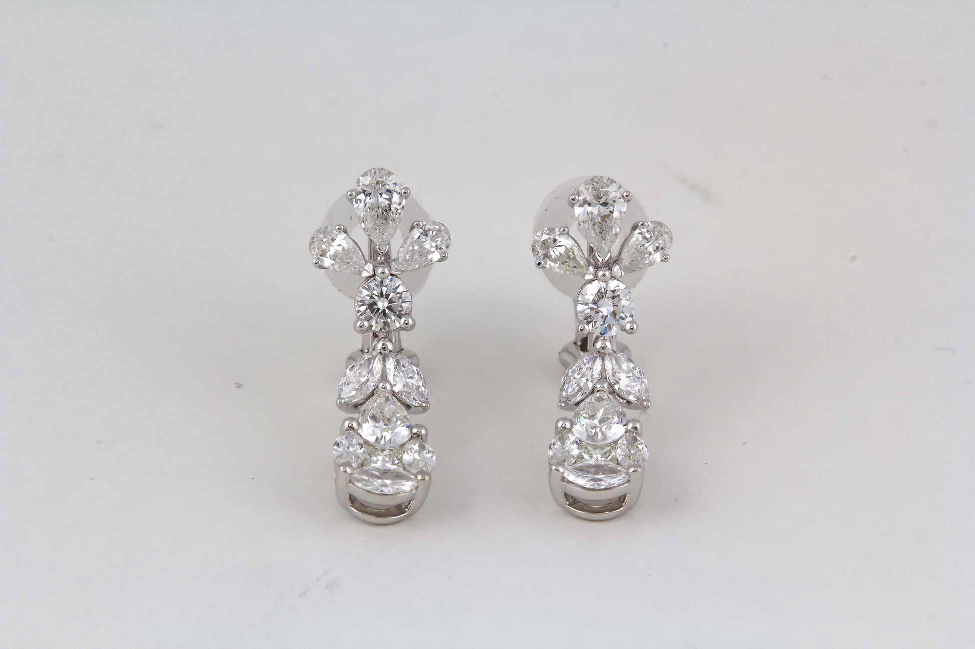 https://a.1stdibscdn.com/classic-diamond-drop-earrings-for-sale-picture-6/j_415/j_168438521661970465554/IMG_1790_master.jpg