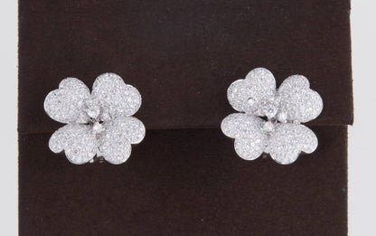https://a.1stdibscdn.com/diamond-white-gold-flower-earrings-for-sale-picture-2/j_415/j_114510421612457332249/IMG_7513_master.jpg?width=768