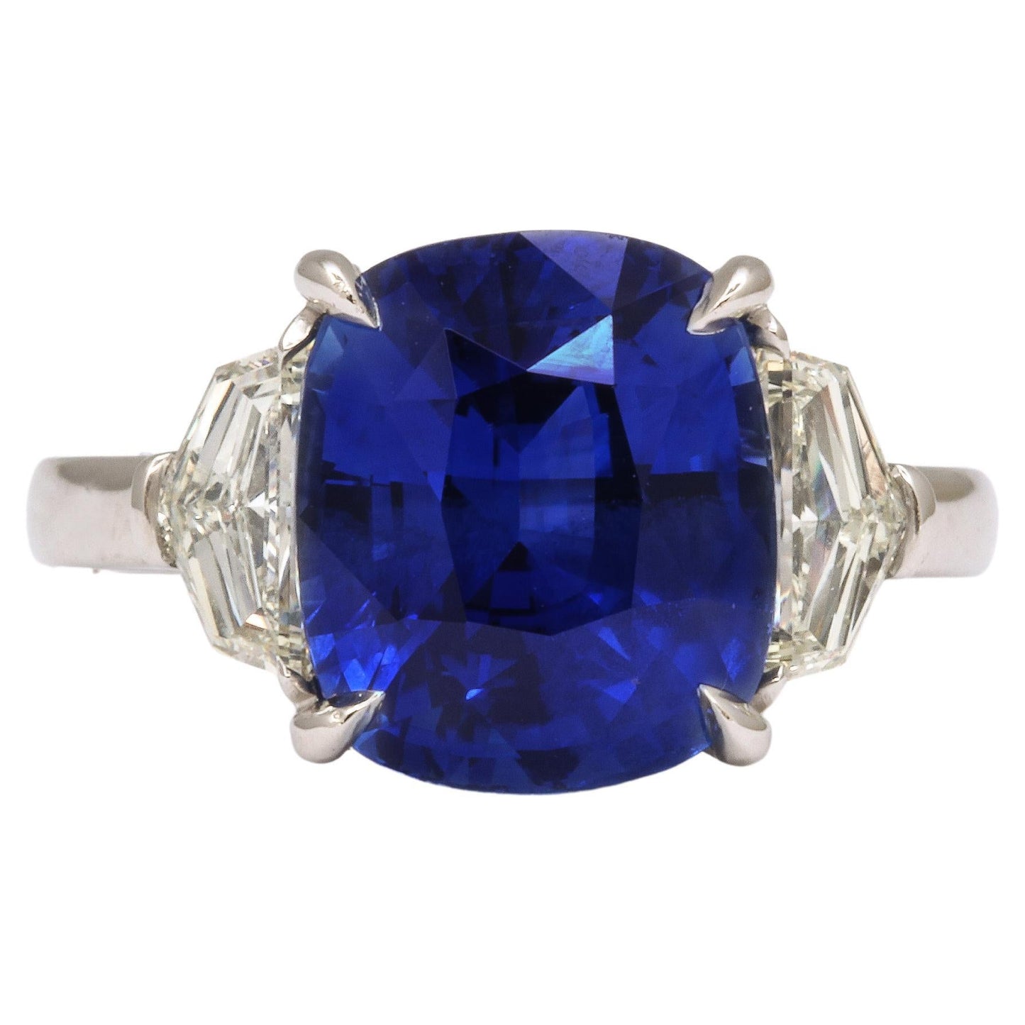 https://a.1stdibscdn.com/7-carat-cushion-cut-sapphire-and-diamond-ring-for-sale/j_415/j_144397121641926910061/j_14439712_1641926910724_bg_processed.jpg