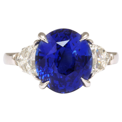 https://a.1stdibscdn.com/6-carat-oval-blue-sapphire-and-diamond-ring-for-sale/j_415/j_144397421641927170096/j_14439742_1641927170668_bg_processed.jpg