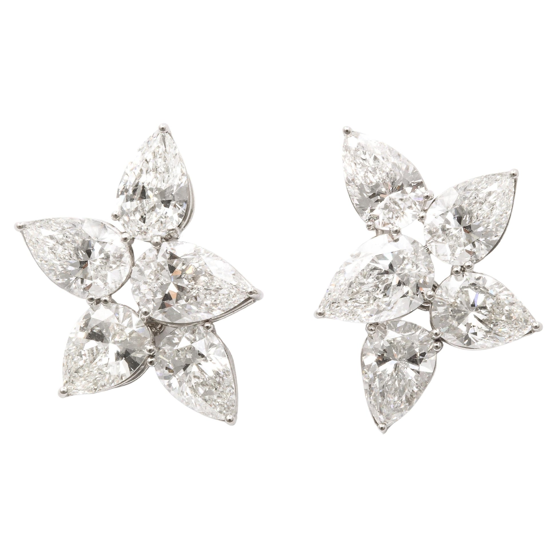 https://a.1stdibscdn.com/diamond-cluster-earrings-for-sale/j_415/j_145871221643387905695/j_14587122_1643387906578_bg_processed.jpg