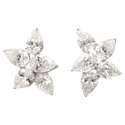 https://a.1stdibscdn.com/diamond-cluster-earrings-for-sale/j_415/j_145871221643387905695/j_14587122_1643387906578_bg_processed.jpg