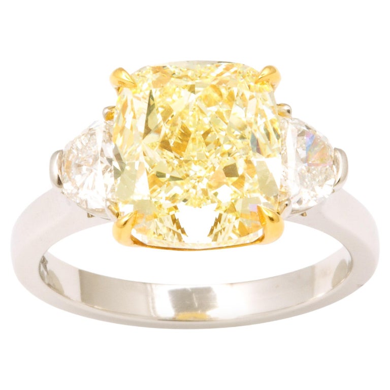 https://a.1stdibscdn.com/5-carat-yellow-diamond-ring-for-sale/j_415/j_154958521650391181549/j_15495852_1650391182189_bg_processed.jpg?width=768