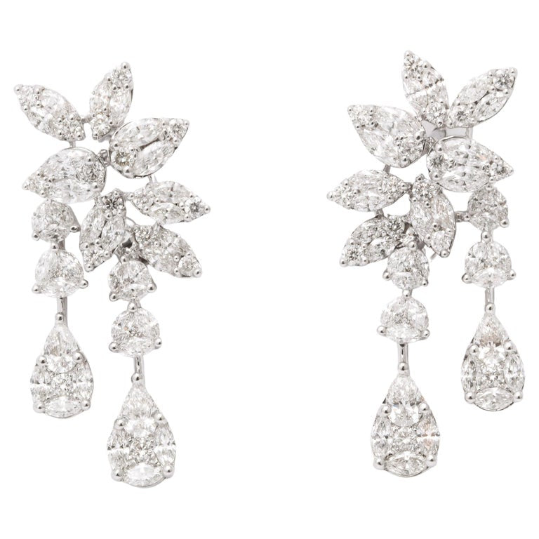https://a.1stdibscdn.com/diamond-cluster-dangle-earring-for-sale/j_415/j_160698521655143248819/j_16069852_1655143249652_bg_processed.jpg?width=768