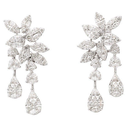 https://a.1stdibscdn.com/diamond-cluster-dangle-earring-for-sale/j_415/j_160698521655143248819/j_16069852_1655143249652_bg_processed.jpg?width=768