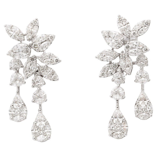 https://a.1stdibscdn.com/diamond-cluster-dangle-earring-for-sale/j_415/j_160698521655143248819/j_16069852_1655143249652_bg_processed.jpg?width=768