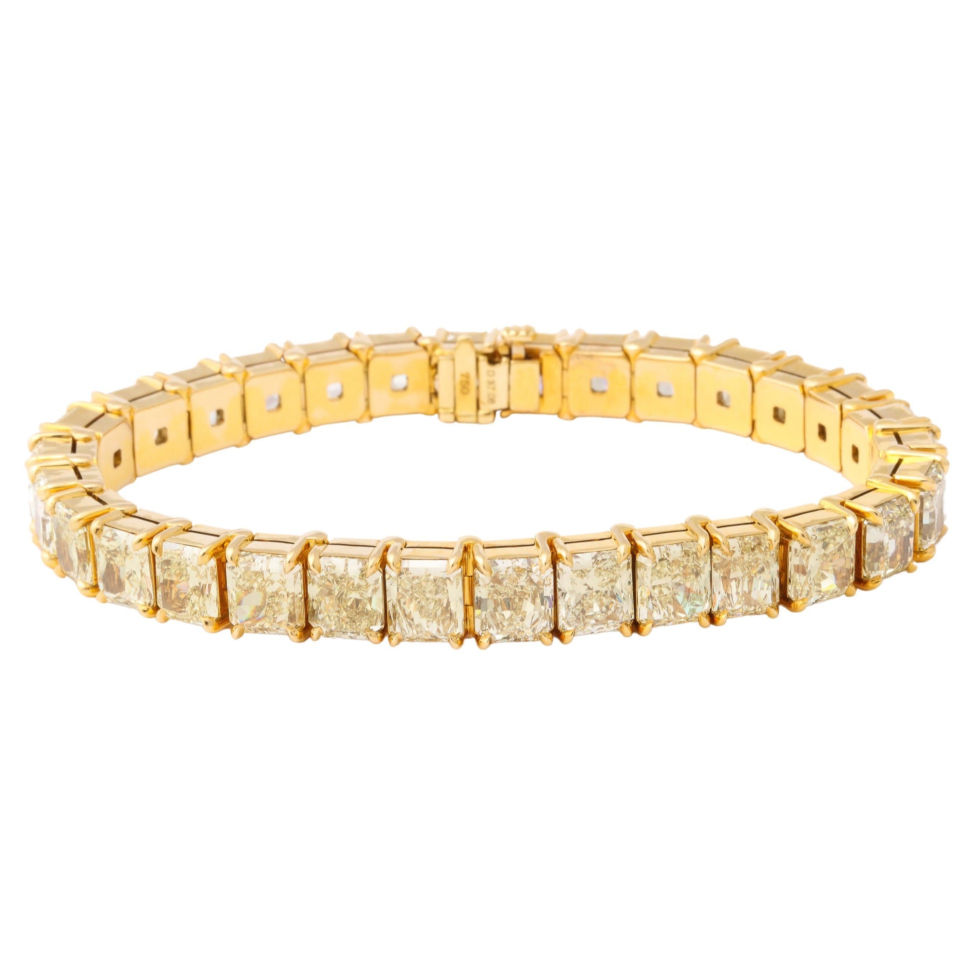 https://a.1stdibscdn.com/radiant-cut-yellow-diamond-bracelet-for-sale/j_415/j_161975821655912033262/j_16197582_1655912034300_bg_processed.jpg
