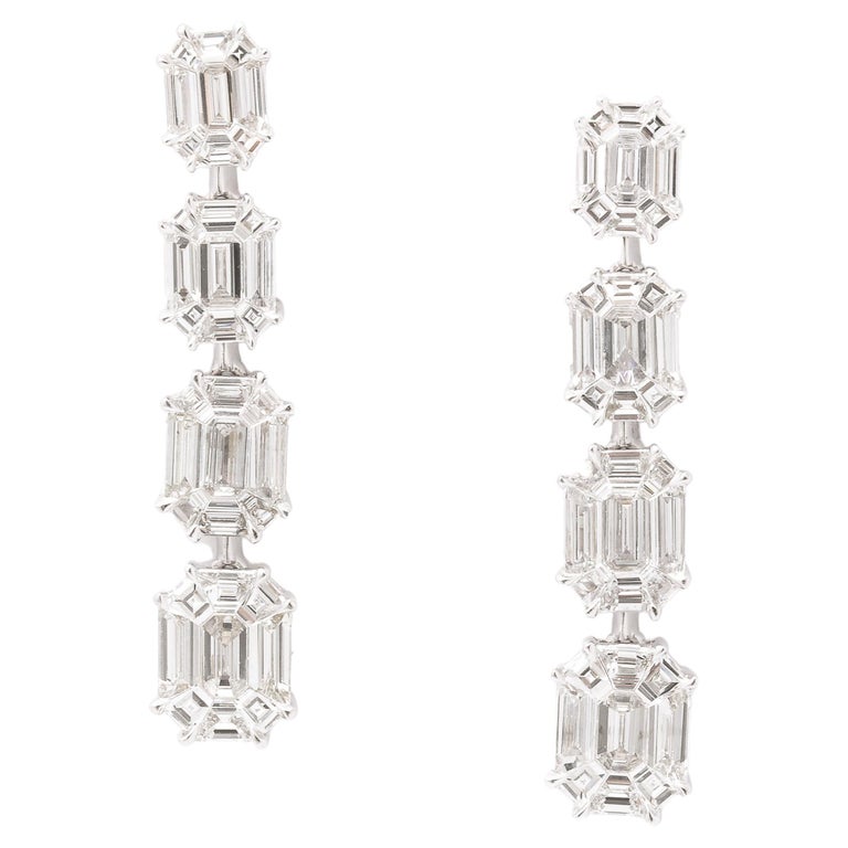 https://a.1stdibscdn.com/emerald-cut-illusion-diamond-dangle-drop-earrings-for-sale/j_415/j_164838221658497361346/j_16483822_1658497361953_bg_processed.jpg?width=768