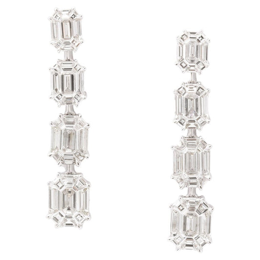 https://a.1stdibscdn.com/emerald-cut-illusion-diamond-dangle-drop-earrings-for-sale/j_415/j_164838221658497361346/j_16483822_1658497361953_bg_processed.jpg?width=768