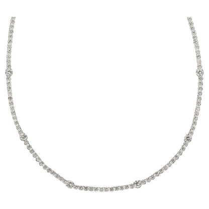 https://a.1stdibscdn.com/diamond-tennis-necklace-for-sale/j_415/j_166501421659967513064/j_16650142_1659967514123_bg_processed.jpg?width=768