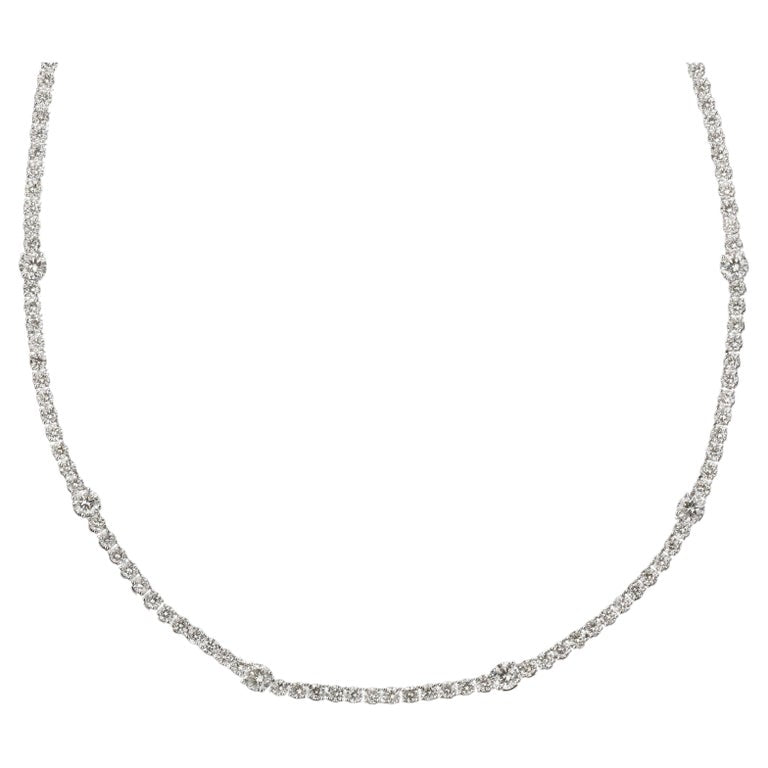 https://a.1stdibscdn.com/diamond-tennis-necklace-for-sale/j_415/j_166501421659967513064/j_16650142_1659967514123_bg_processed.jpg?width=768