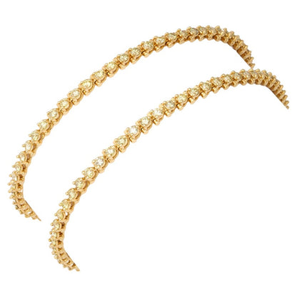https://a.1stdibscdn.com/yellow-diamond-bracelets-for-sale/j_415/j_168334521661871101700/j_16833452_1661871102437_bg_processed.jpg?width=768