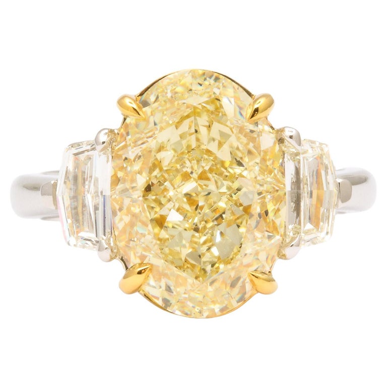 https://a.1stdibscdn.com/6-carat-oval-yellow-diamond-ring-gia-certified-for-sale/j_415/j_180650221672242049456/j_18065022_1672242049950_bg_processed.jpg?width=768