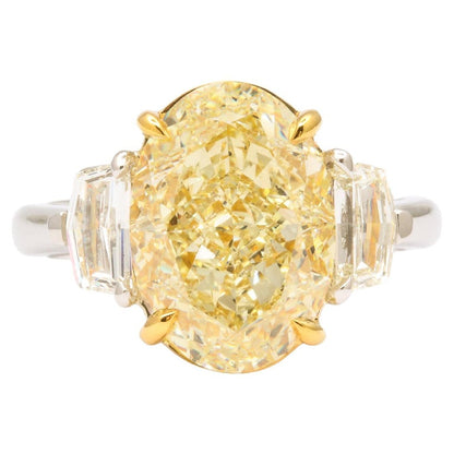https://a.1stdibscdn.com/6-carat-oval-yellow-diamond-ring-gia-certified-for-sale/j_415/j_180650221672242049456/j_18065022_1672242049950_bg_processed.jpg?width=768
