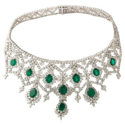 https://a.1stdibscdn.com/emerald-and-diamond-choker-necklace-for-sale/j_415/j_183831221675869278488/j_18383122_1675869279827_bg_processed.jpg?width=768
