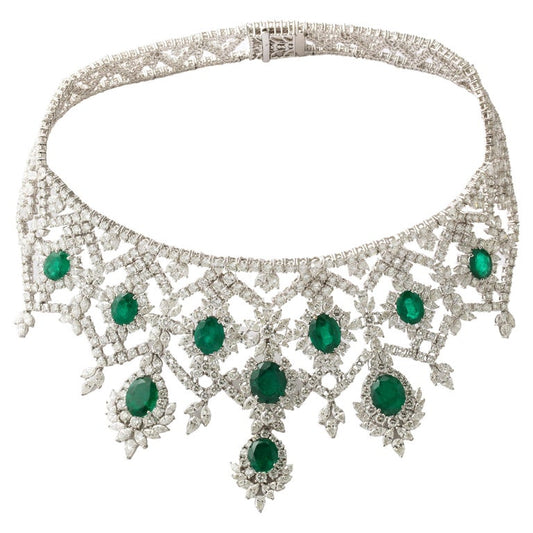 https://a.1stdibscdn.com/emerald-and-diamond-choker-necklace-for-sale/j_415/j_183831221675869278488/j_18383122_1675869279827_bg_processed.jpg?width=768