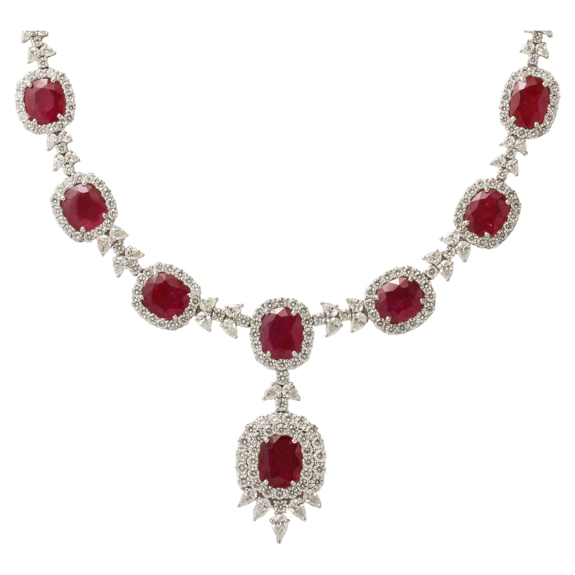 https://a.1stdibscdn.com/ruby-and-diamond-drop-necklace-for-sale/j_415/j_183836821675872219343/j_18383682_1675872220595_bg_processed.jpg