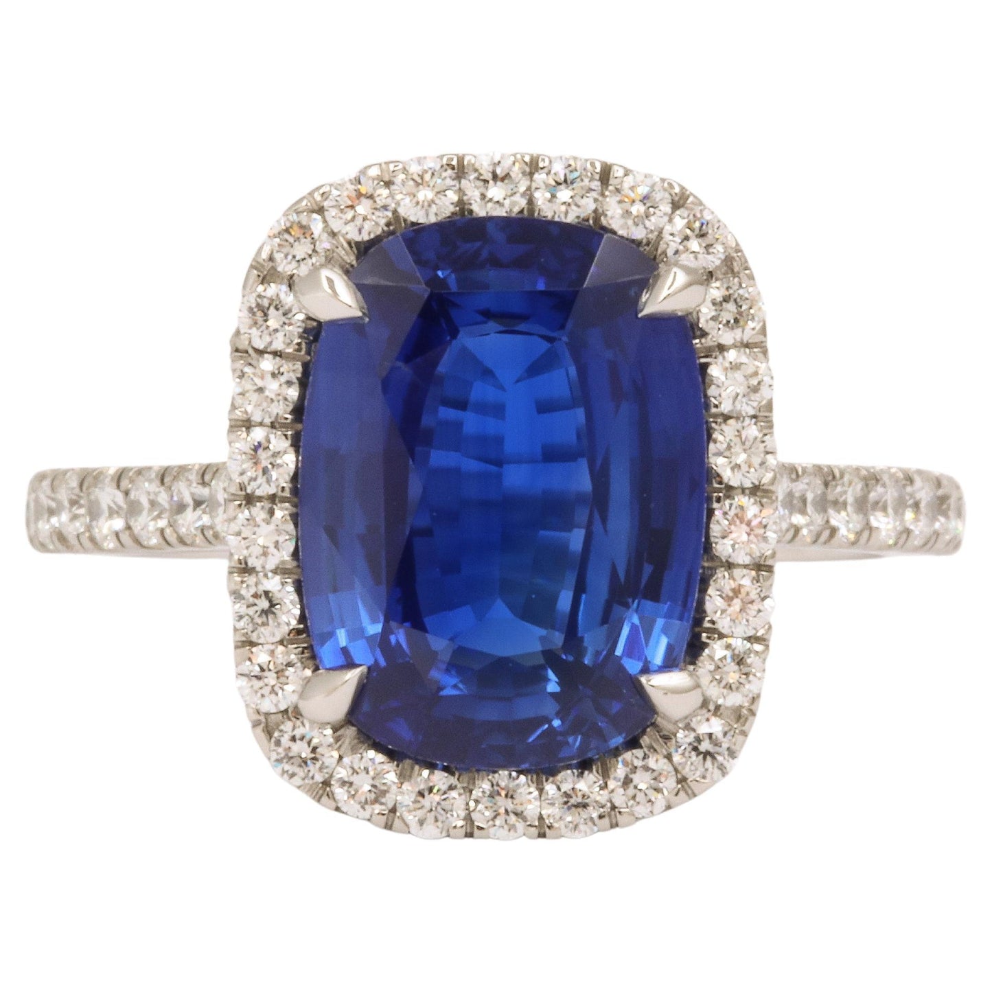 https://a.1stdibscdn.com/cushion-cut-blue-sapphire-and-diamond-halo-ring-for-sale/j_415/j_194450021685541099600/j_19445002_1685541100463_bg_processed.jpg