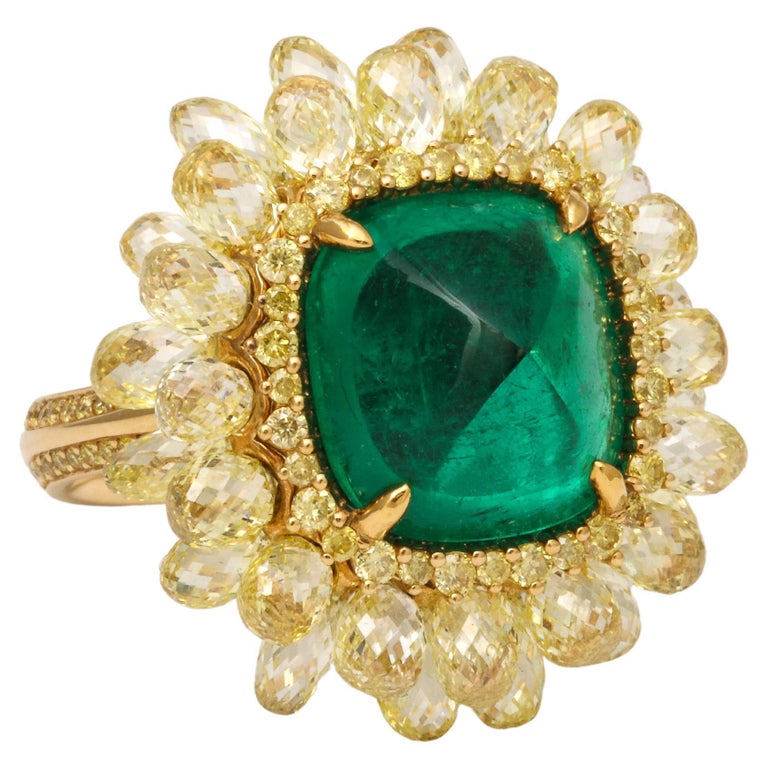https://a.1stdibscdn.com/5-carat-sugarloaf-cabochon-emerald-and-yellow-diamond-ring-for-sale/j_415/j_202926121694024684669/j_20292612_1694024685439_bg_processed.jpg?width=768