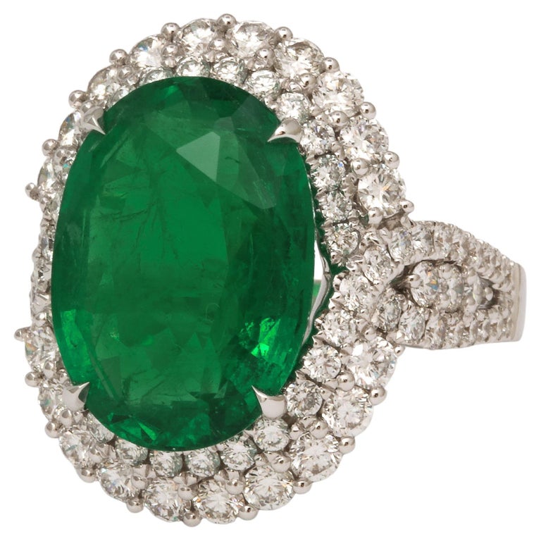 https://a.1stdibscdn.com/9-carat-vivid-green-emerald-and-diamond-ring-for-sale/j_415/j_202926821694024948397/j_20292682_1694024949294_bg_processed.jpg?width=768