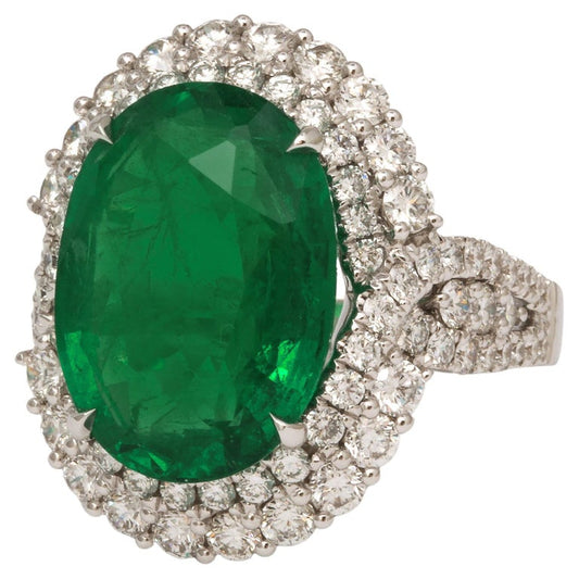 https://a.1stdibscdn.com/9-carat-vivid-green-emerald-and-diamond-ring-for-sale/j_415/j_202926821694024948397/j_20292682_1694024949294_bg_processed.jpg?width=768