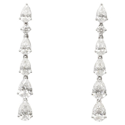 https://a.1stdibscdn.com/pear-shape-dangle-drop-earring-for-sale/j_415/j_210150921700065561464/j_21015092_1700065562248_bg_processed.jpg?width=768